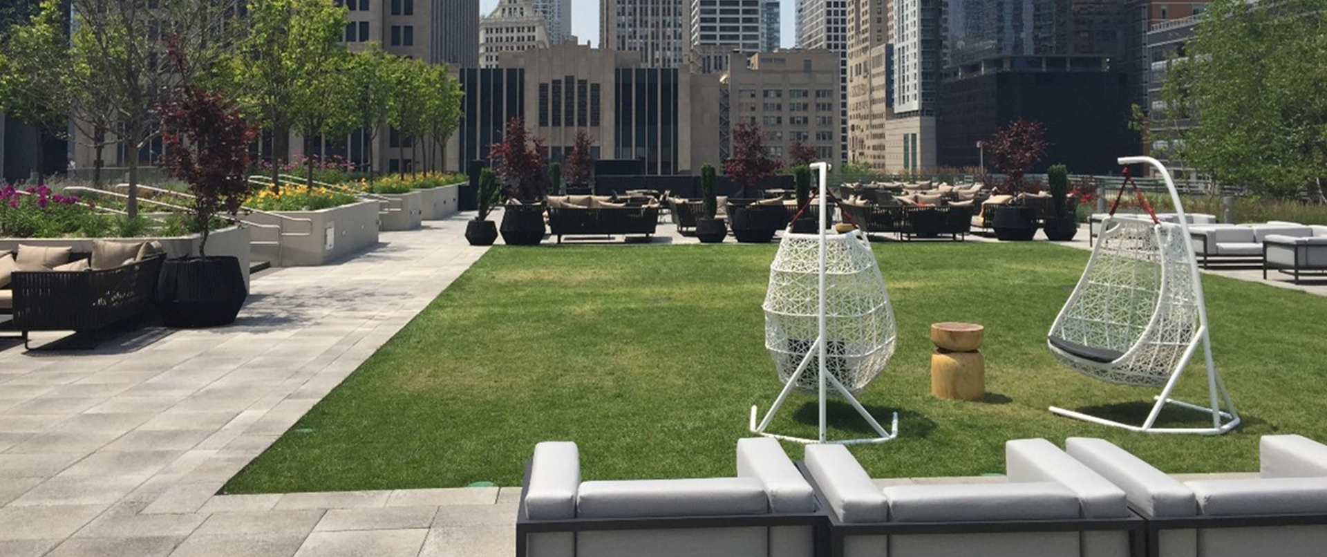 Rooftop Lounge Seating Area with Greenspace Rooftop Lounge Seating Area with Greenspace