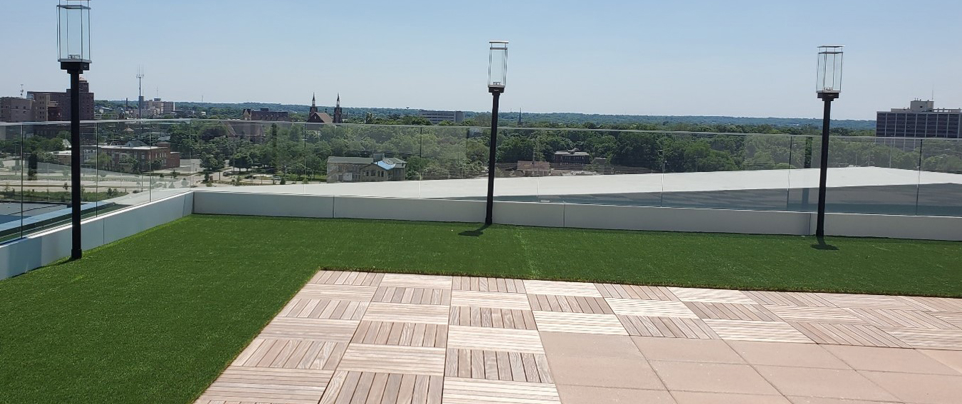 Wood Tile Rooftop with Greenspace Wood Tile Rooftop with Greenspace